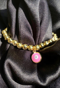 Pink Evil Eye Bead Bracelet in Gold